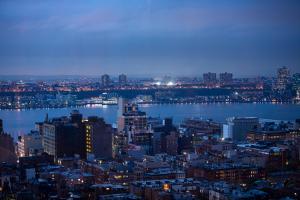 a view of a large city at night at InterContinental New York Times Square by IHG in New York