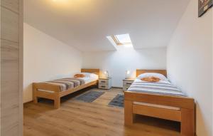Posteľ alebo postele v izbe v ubytovaní Three-Bedroom Holiday Home In Buje