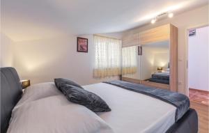 Posteľ alebo postele v izbe v ubytovaní Three-Bedroom Holiday Home In Buje