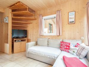 TV a/nebo společenská místnost v ubytování Chalet in Stadl near Kreischberg Ski Slopes