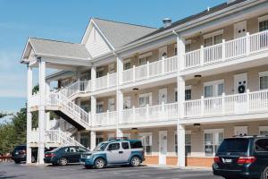 a large building with cars parked in front of it at The Sanctuary Company Johnson City in Johnson City