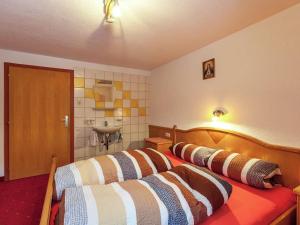 Voodi või voodid majutusasutuse Apartment in See near Ski Slopes toas