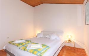 Postel nebo postele na pokoji v ubytování Apartment Stanici Iii