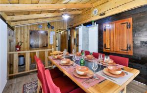 A restaurant or other place to eat at Stunning Home In Krizanec With Sauna