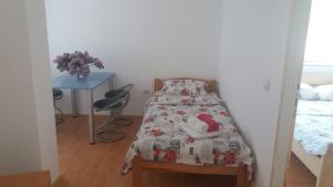 Voodi või voodid majutusasutuse Apartmani Čubura toas