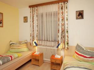 Ein Bett oder Betten in einem Zimmer der Unterkunft Apartment in Wagrain near Ski Slopes
