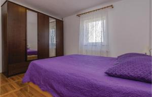 Katil atau katil-katil dalam bilik di Two-Bedroom Apartment In Razanac