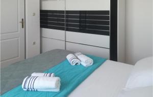 Postel nebo postele na pokoji v ubytování Gorgeous Apartment In Mali Losinj
