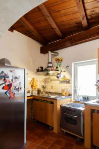 Kuchyň nebo kuchyňský kout v ubytování Casa Brunella