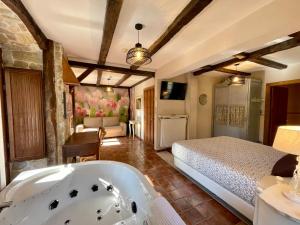Cama o camas de una habitación en Akla La Casa Del Puente