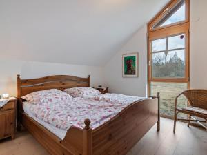 Una cama o camas en una habitación de Country house in St Georgen im Gailtal near Nassfeld