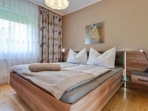 
Ein Bett oder Betten in einem Zimmer der Unterkunft Feriendorf Hemmadorf
