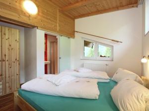 Voodi või voodid majutusasutuse Apartment in Fügenberg near Ski Slopes toas
