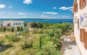 a view of the water from a building at Amazing Home In Maslenica With 4 Bedrooms in Maslenica