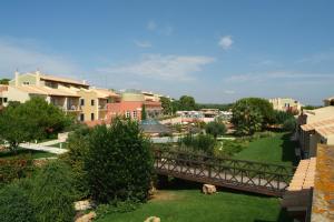 a view of a town with buildings and a bridge at Grupotel Playa Club in Son Xoriguer