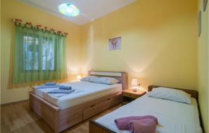 Posteľ alebo postele v izbe v ubytovaní Holiday Home Omiska I