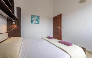 Postel nebo postele na pokoji v ubytování Apartment Sibenska Vi