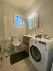 Koupelna v ubytování DiFan Sea Homes A2 + 28 fotografií