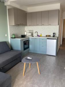 Kuchyň nebo kuchyňský kout v ubytování DiFan Sea Homes A2