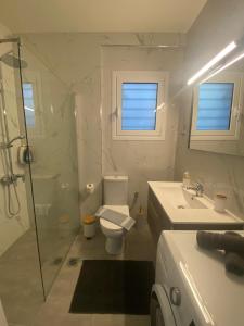 Koupelna v ubytování DiFan Sea Homes A2