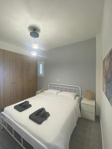 Postel nebo postele na pokoji v ubytování DiFan Sea Homes A2