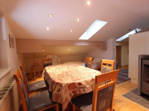 a kitchen and dining room with a table and chairs at Nice apartment in Westendorf Tyrol near ski area in Westendorf