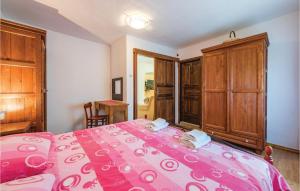 Łóżko lub łóżka w pokoju w obiekcie Holiday Home Damijanici Vi