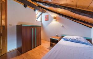 Łóżko lub łóżka w pokoju w obiekcie Holiday Home Damijanici Vi