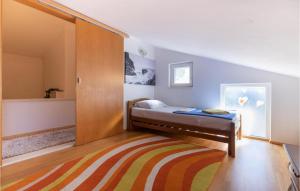 Postel nebo postele na pokoji v ubytování Studio Apartment In Klek