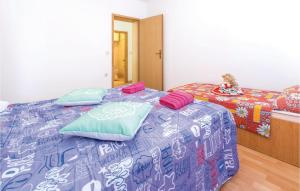 Postel nebo postele na pokoji v ubytování 1 Bedroom Cozy Apartment In Vidalici