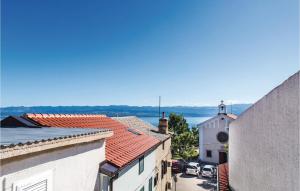 an aerial view of a city with buildings at 1 Bedroom Nice Apartment In Vrbnik in Vrbnik