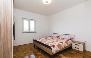 Posteľ alebo postele v izbe v ubytovaní Two-Bedroom Apartment In Dracevac Ninski + 10 fotografií