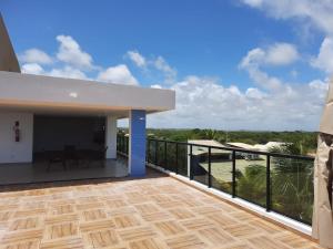 a view from the balcony of a house at Lindo Flat no Residencial Maraca Beach in Porto De Galinhas