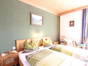 Posteľ alebo postele v izbe v ubytovaní Chalet in Austria near Ski Slopes + 31 fotografií