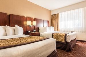 Letto o letti in una camera di Hotel Moab Downtown
