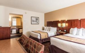 Letto o letti in una camera di Hotel Moab Downtown
