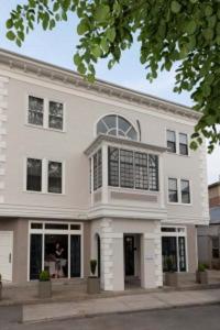 a large white building with a large window at The Attwater in Newport