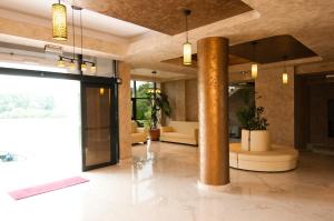 Zona de hol sau recepție la Hotel Hyperion +64 fotografii