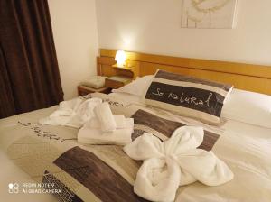 Postel nebo postele na pokoji v ubytování Mini hotel