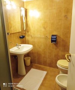 Koupelna v ubytování Mini hotel