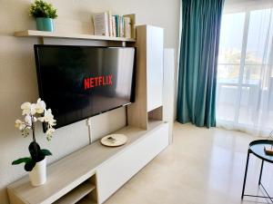TV a/nebo společenská místnost v ubytování Apartamento Amanecer