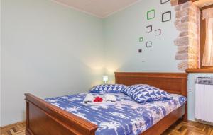 Posteľ alebo postele v izbe v ubytovaní Holiday Home Puzari Vi