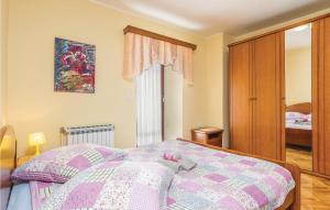 Posteľ alebo postele v izbe v ubytovaní Holiday Home Puzari Vi