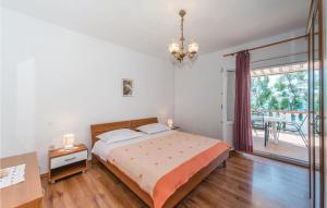 Posteľ alebo postele v izbe v ubytovaní 2 Bedroom Lovely Apartment In Kustici