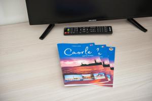 TV a/nebo společenská místnost v ubytování Hotel Columbus
