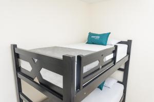 Rúm í herbergi á Hotel Itaka