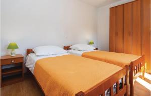 Postel nebo postele na pokoji v ubytování Holiday Home Povlja With Sea View I