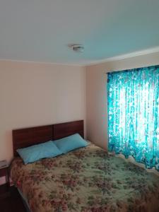 เตียงในห้องที่ Cabañas El Pirata