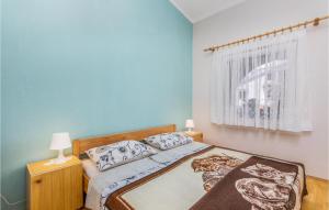 Postel nebo postele na pokoji v ubytování 2 Bedroom Amazing Apartment In Pinezici