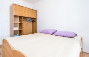 Posteľ alebo postele v izbe v ubytovaní Apartment Gruda Molunat Ii